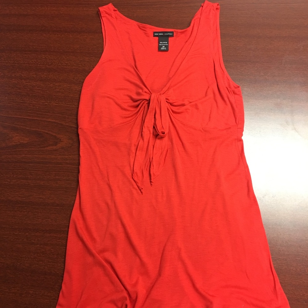 Red sleeveless top